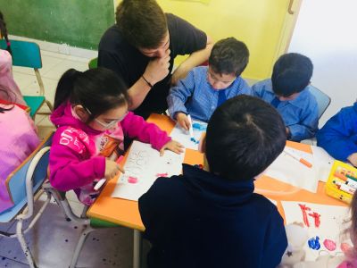 Jack working at a community kindergarten in Buenos Aires